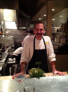 If eating solo, sit near the kitchen where you can watch Chef Greg Atkinson and his team use fresh ingredients for their dishes. Photo by Christine Willmsen