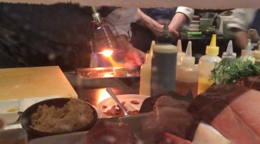 Chef Tony Messina sears the foie gras for this spicy tuna dish. 